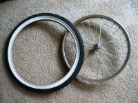 tires and wheel Re-spoked front wheel and new tire
