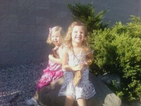 Cell phone picture: Madison and Skylar wait for ice cream