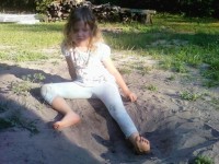 Cell phone picture: Skylar playing in the sand